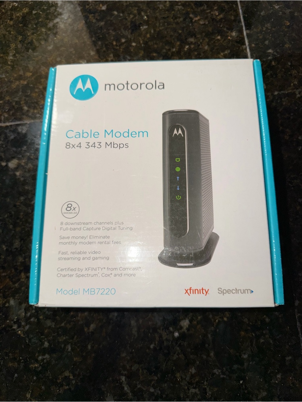 Motorola Black and Teal Cable Modem Box - MB7220